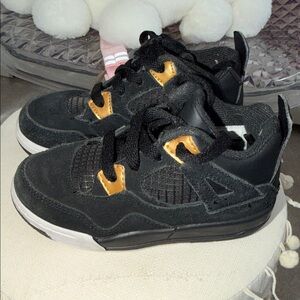 Jordan Kids Black Sneakers with Gold Accents